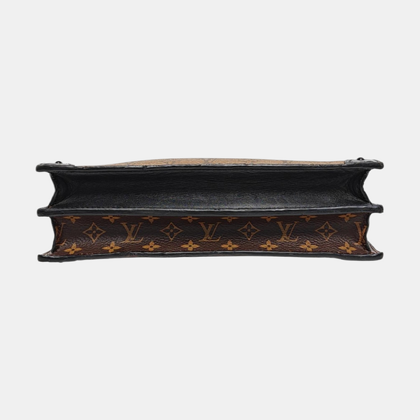 TRUNK Monogram Coated Canvas Brown