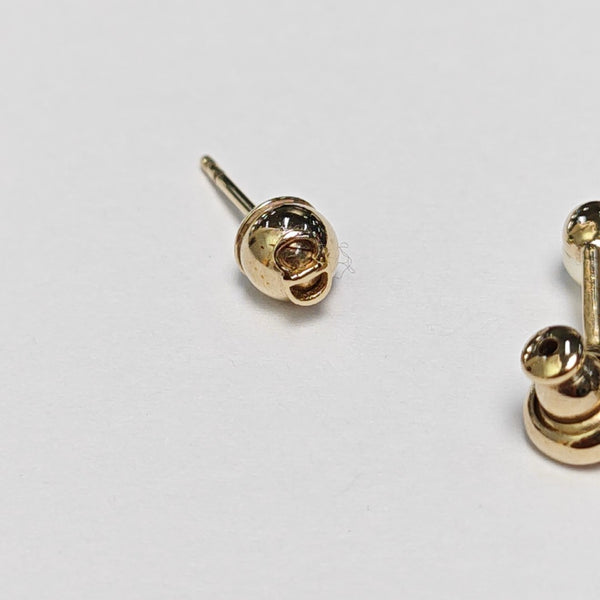 La Petite Tribale Metal Gold Stud Earrings