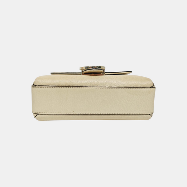 Piel de becerro mini con G entrelazada Beige