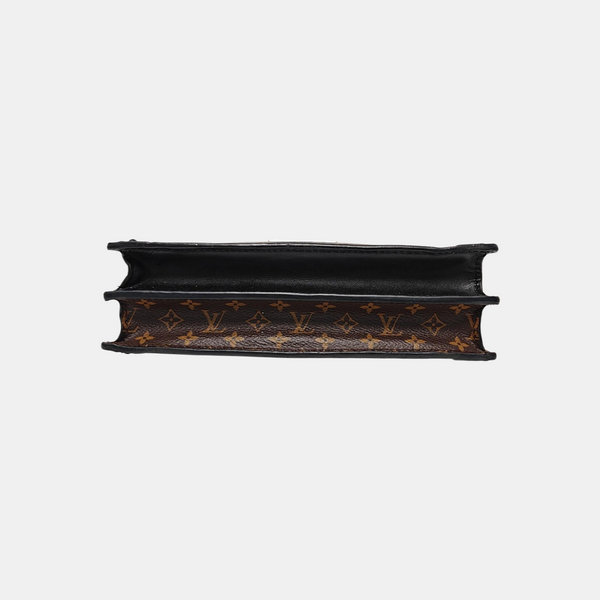 TRUNK Monogram Coated Canvas Brown