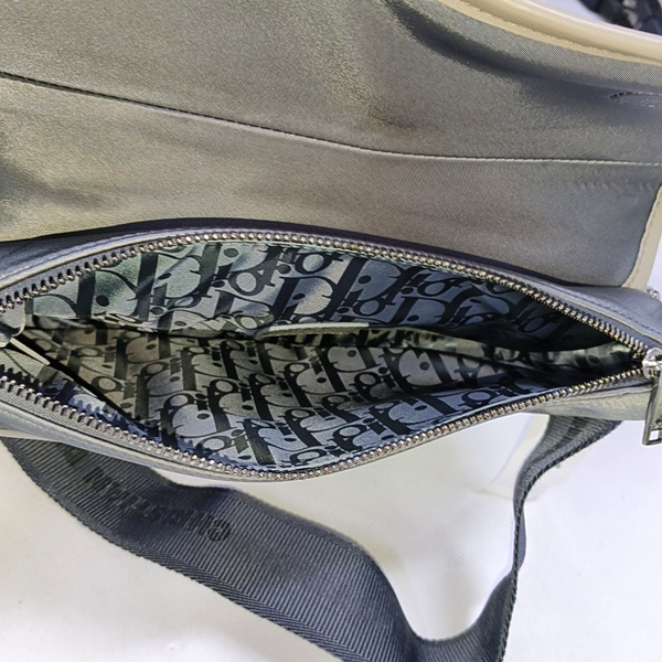 Authenticated pre-owned Saddle Calfskin Gray - Crossbody Bag at Looply