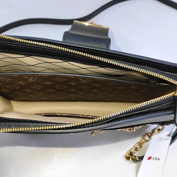 TRUNK Monogram Coated Canvas Brown