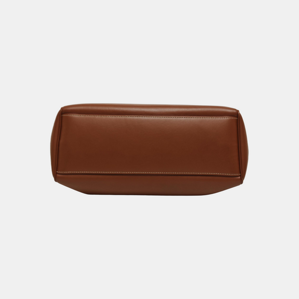 Authenticated pre-owned 16 Medium Calfskin Brown - Top Handle Bag at Looply