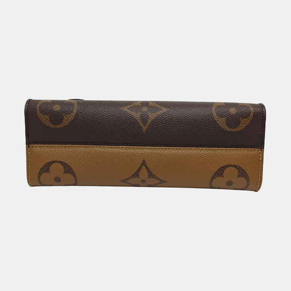 ONTHEGO EAST WEST PM Monogram Coated Canvas Brown