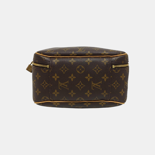 EXCURSION Monogram Coated Canvas Brown
