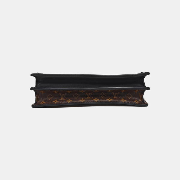 TRUNK Monogram Coated Canvas Brown