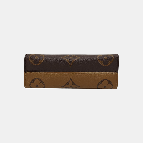 ONTHEGO EAST WEST PM Monogram Coated Canvas Brown