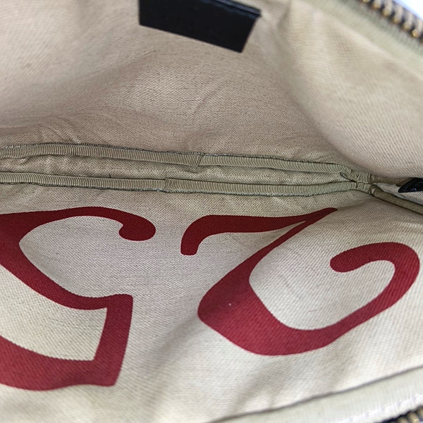Authenticated pre-owned GG Marmont Monogram Coated Canvas Beige - Clutch at Looply