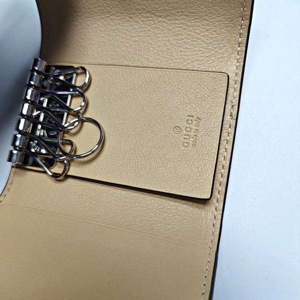 Monedero llavero GG Marmont de lona monogram en beis