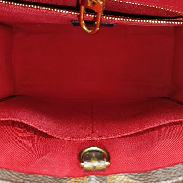 ONTHEGO PM Monogram Coated Canvas Brown