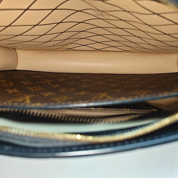 TRUNK Monogram Coated Canvas Brown