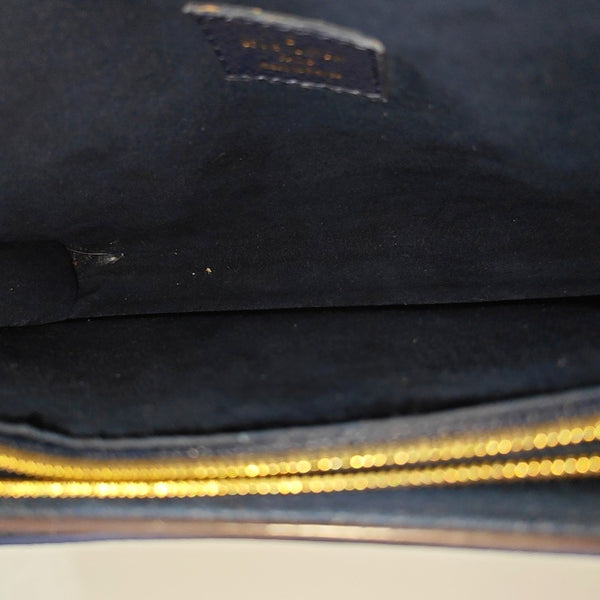 VICTOIRE Monogram Coated Canvas Brown