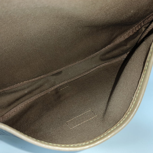 SAUMUR 30 Monogram Coated Canvas Brown