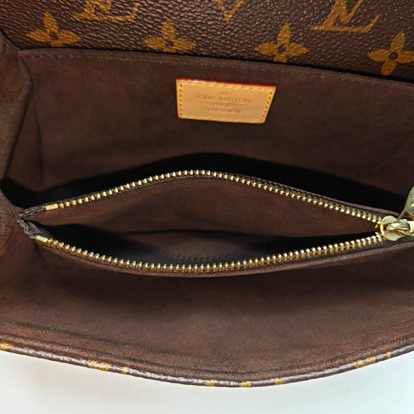 MÉTIS EAST WEST Monogram Coated Canvas Brown
