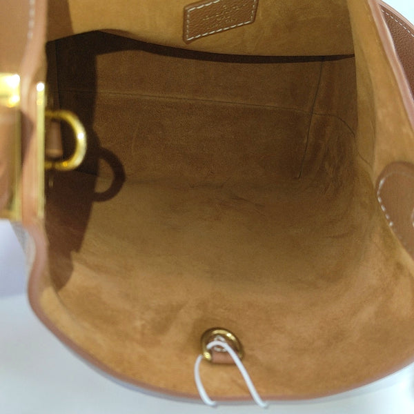 LOW KEY HOBO PM Monogram Calfskin Brown