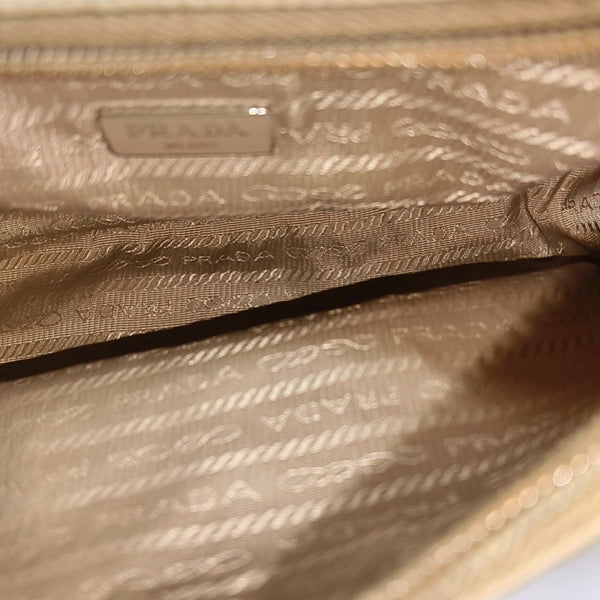 Authenticated pre-owned Re-Edition2000 Mini Nylon Beige - Top Handle Bag at Looply