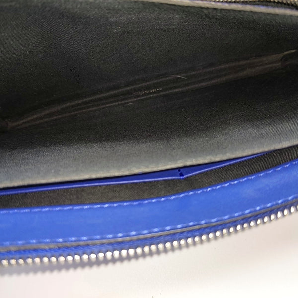 Authenticated pre-owned Monster Calfskin Blue - Clutch at Looply