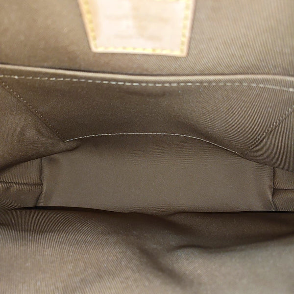EXCURSION PM Monogram Coated Canvas Brown