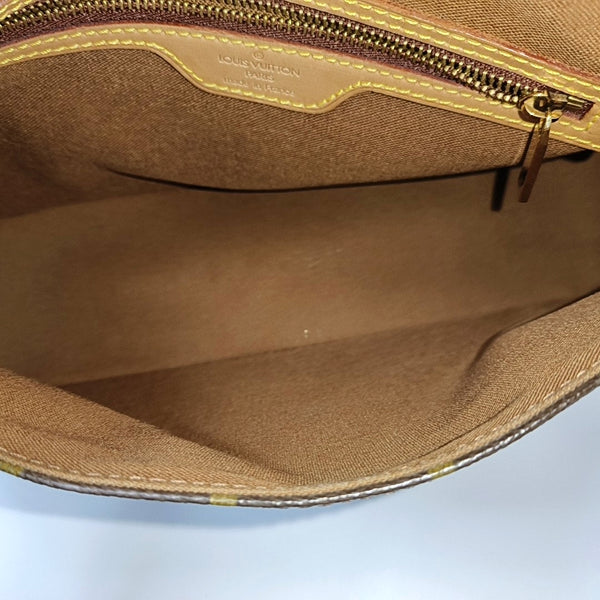 LOOPING PM Monogram Coated Canvas Brown