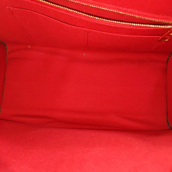 ONTHEGO MM Monogram Coated Canvas Brown
