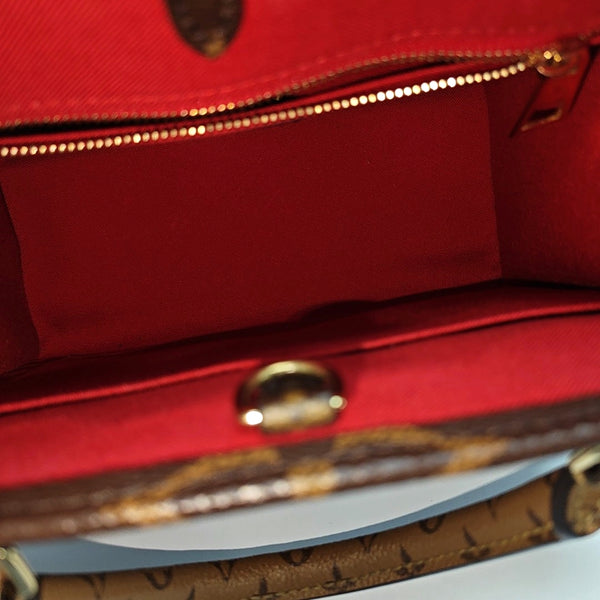 ONTHEGO PM Monogram Coated Canvas Brown