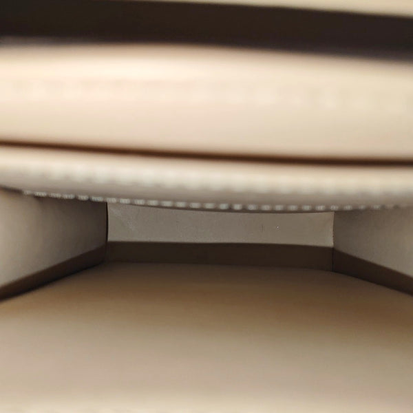 TRUNK Monogram Coated Canvas Brown