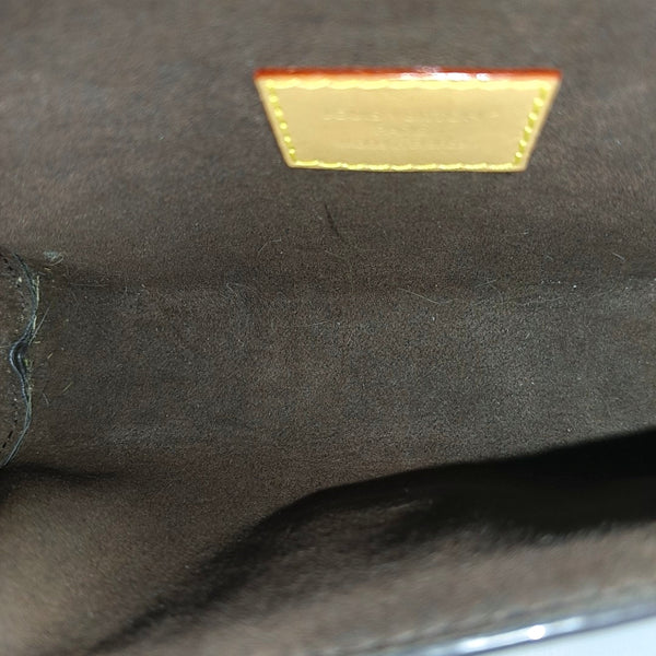 Pochette Camille Monogram Coated Canvas Brown