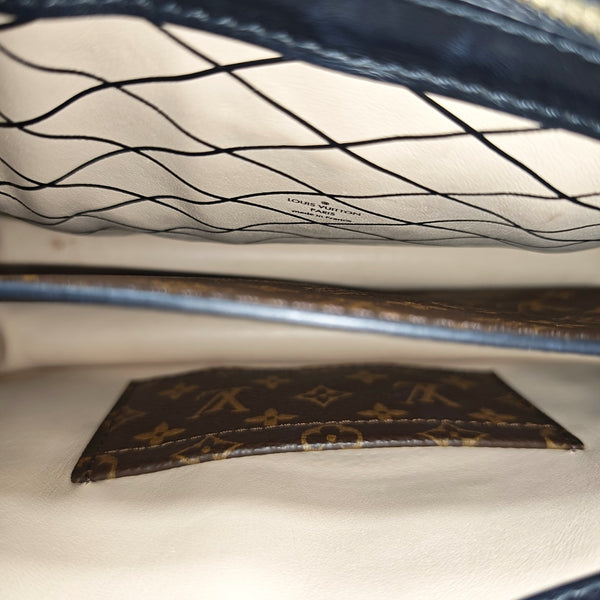 TRUNK Monogram Coated Canvas Brown