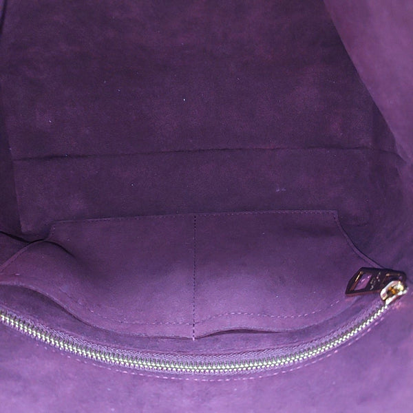 CARRYALL PM Monogram Coated Canvas Brown