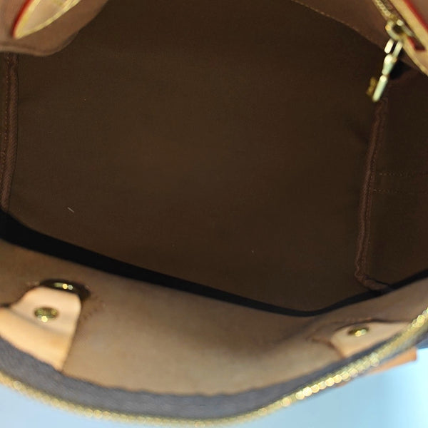 SPEEDY 30 Monogram Coated Canvas Brown