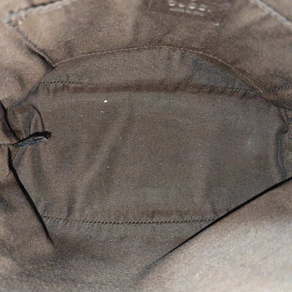 Dome Monogram Coated Canvas Brown