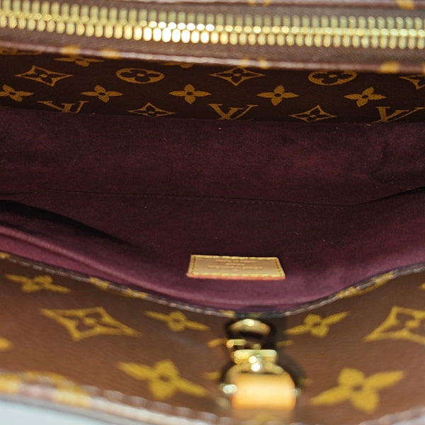 MONTAIGNE GM Monogram Coated Canvas Brown