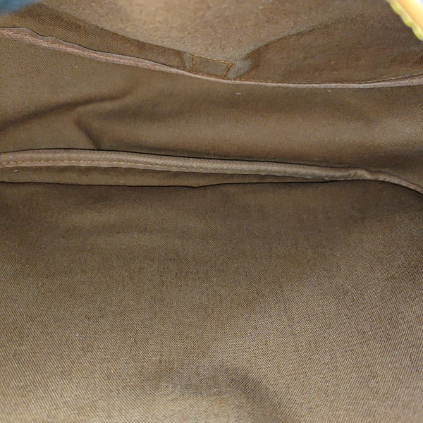 SAUMUR Monogram Coated Canvas Brown