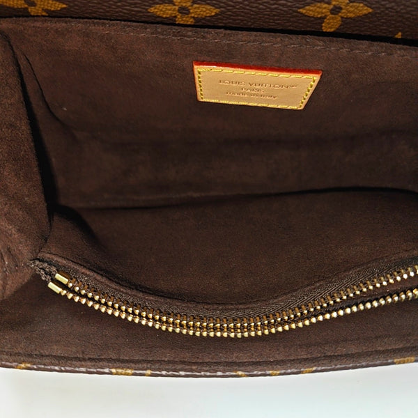 MÉTIS EAST WEST Monogram Coated Canvas Brown