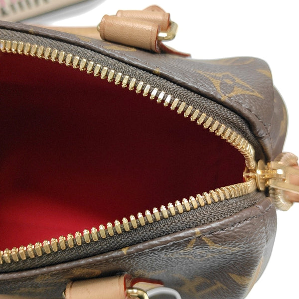SPEEDY 20 Monogram Coated Canvas Brown