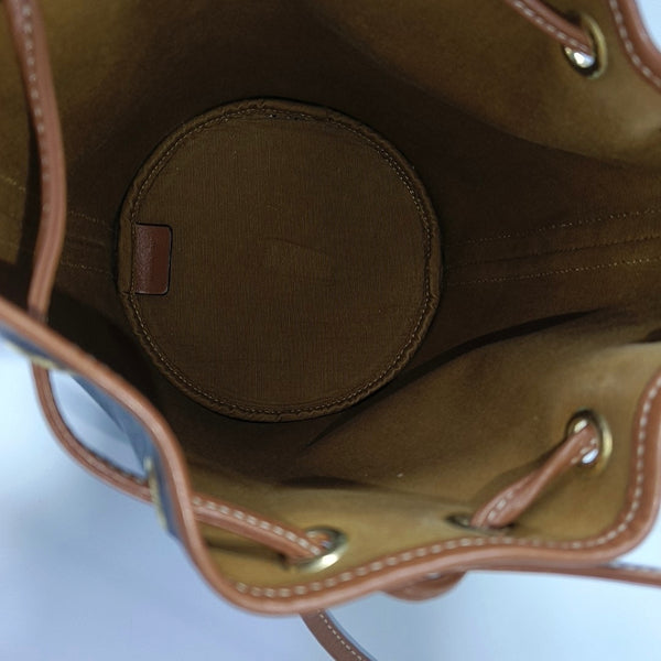 Authenticated pre-owned TRIOMPHE CANVAS Small Coated Canvas Brown - Bucket Bag at Looply