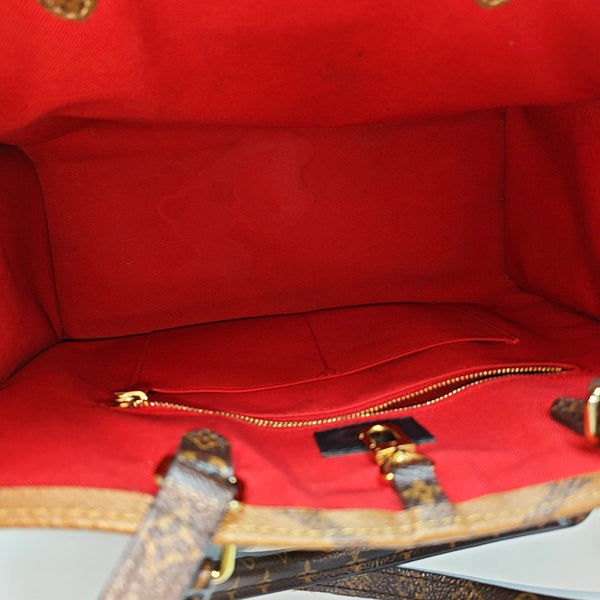 ONTHEGO MM Monogram Coated Canvas Brown