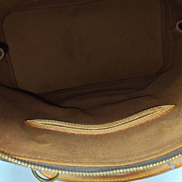 ALMA PM Monogram Coated Canvas Brown