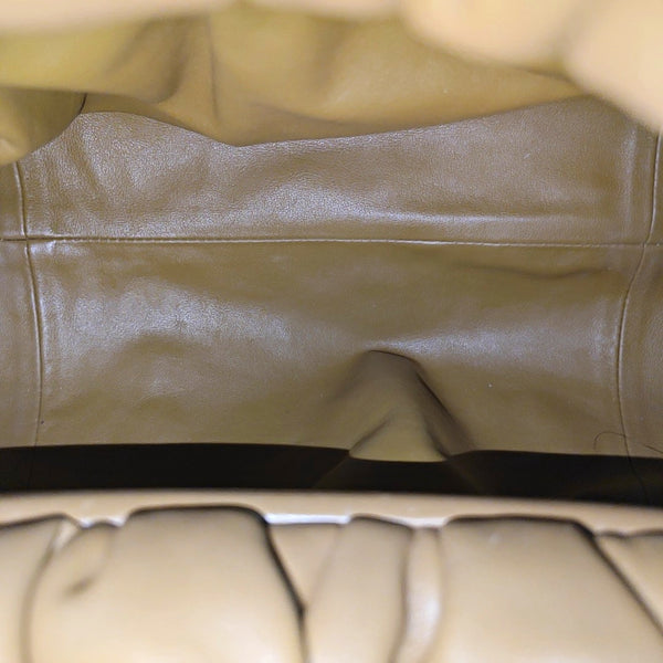 Authenticated pre-owned The Pouch Calfskin Brown - Top Handle Bag at Looply