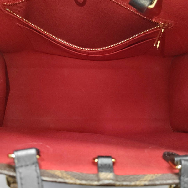 ONTHEGO MM Monogram Coated Canvas Brown