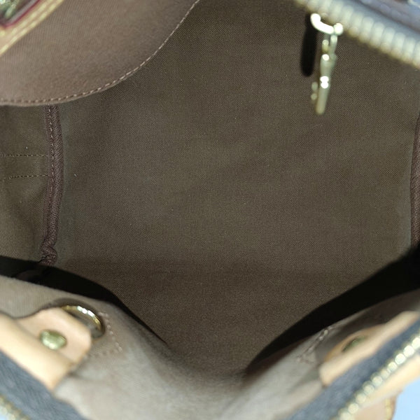 SPEEDY 25 Monogram Coated Canvas Brown