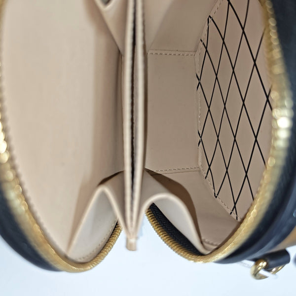 BOITE CHAPEAU Mini Monogram Coated Canvas Brown