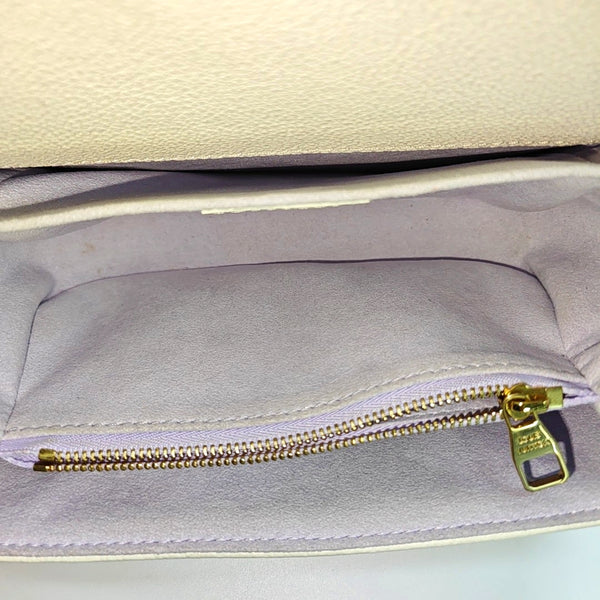 MÉTIS EAST WEST Monogram Calfskin White