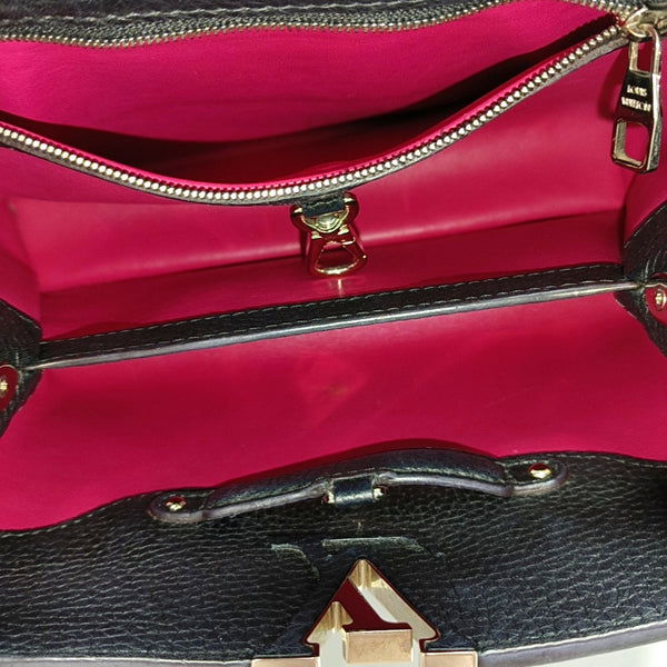 Authenticated pre-owned CAPUCINES BB Calfskin Black - Shoulder Bag at Looply