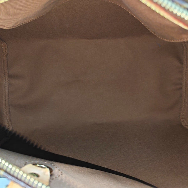 Authenticated pre-owned SPEEDY 35 Monogram Coated Canvas Brown - Top Handle Bag at Looply
