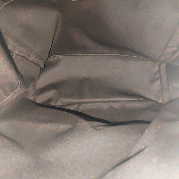 Monogram Coated Canvas Backpack Brown