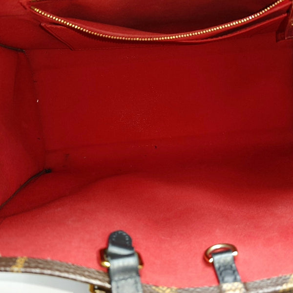 ONTHEGO MM Monogram Coated Canvas Brown