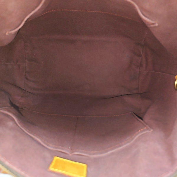 TURENNE MM Monogram Coated Canvas Brown