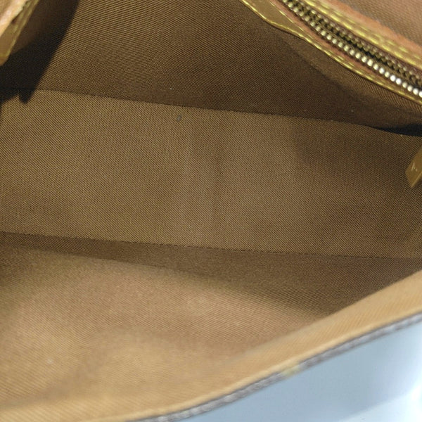 LOOPING PM Monogram Coated Canvas Brown