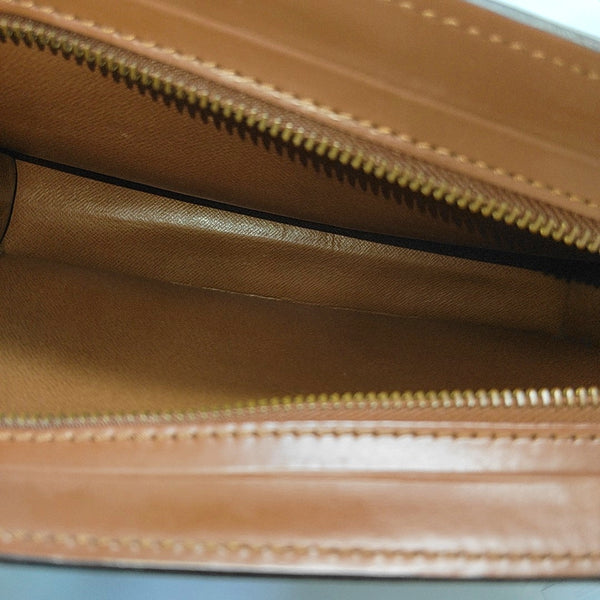 Monogram Coated Canvas Clutch Brown